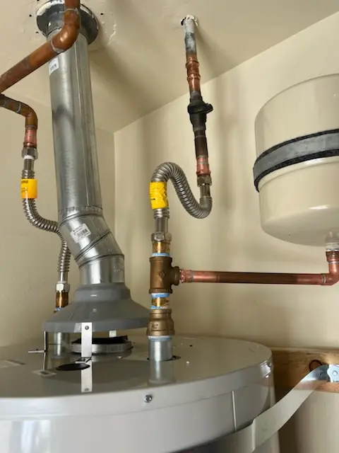 Water heater installation and plumbing repair in Cross Roads